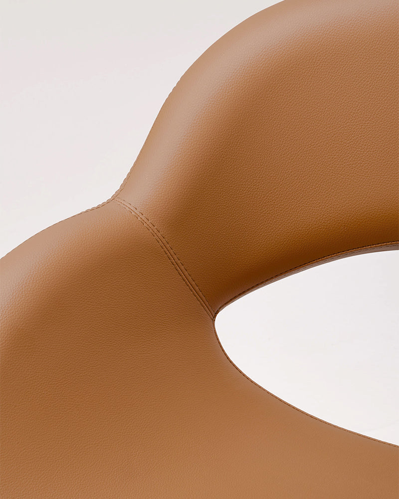 Thea - Cognac styling chair with black O base